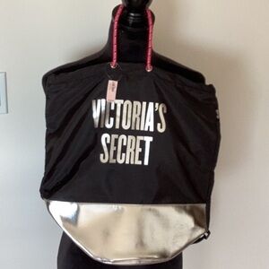 VICTORIA’S Secret black and silver backpack.
